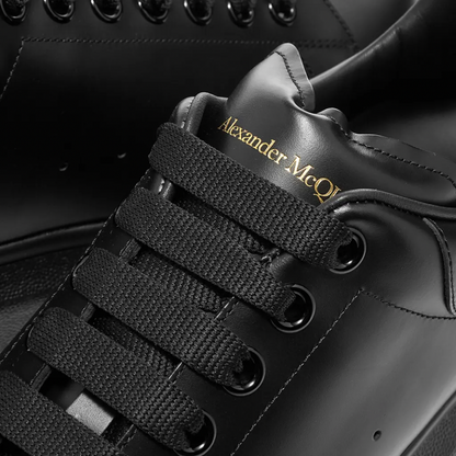 ALEXANDER MCQUEEN WEDGE SOLE SNEAKER TRIPLE BLACK